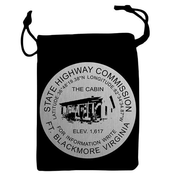A black bag with the state highway commission logo.