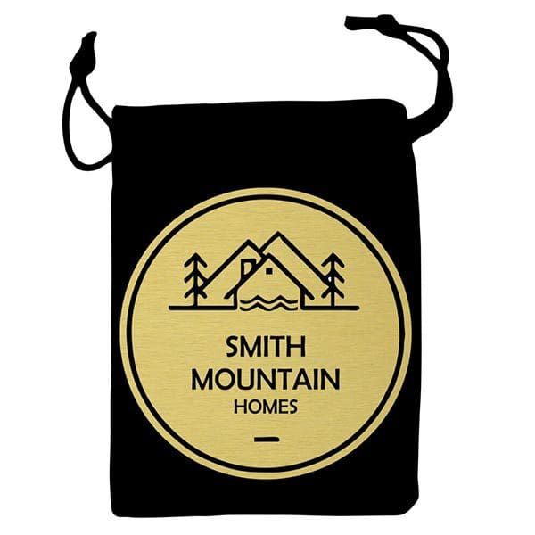 A black bag with a gold mountain logo.