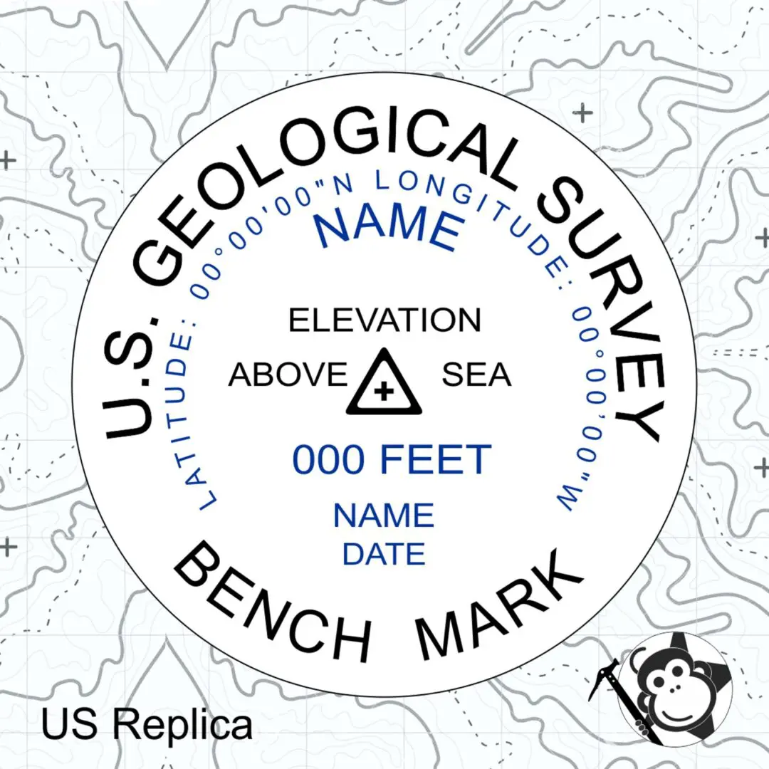 A usgs replica of the us geological survey 's bench mark.