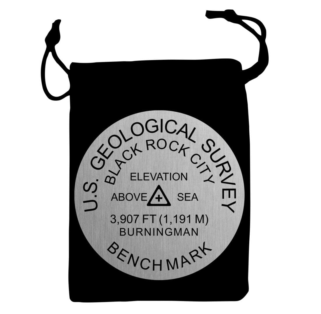 Black Rock City benchmark on a black bag
