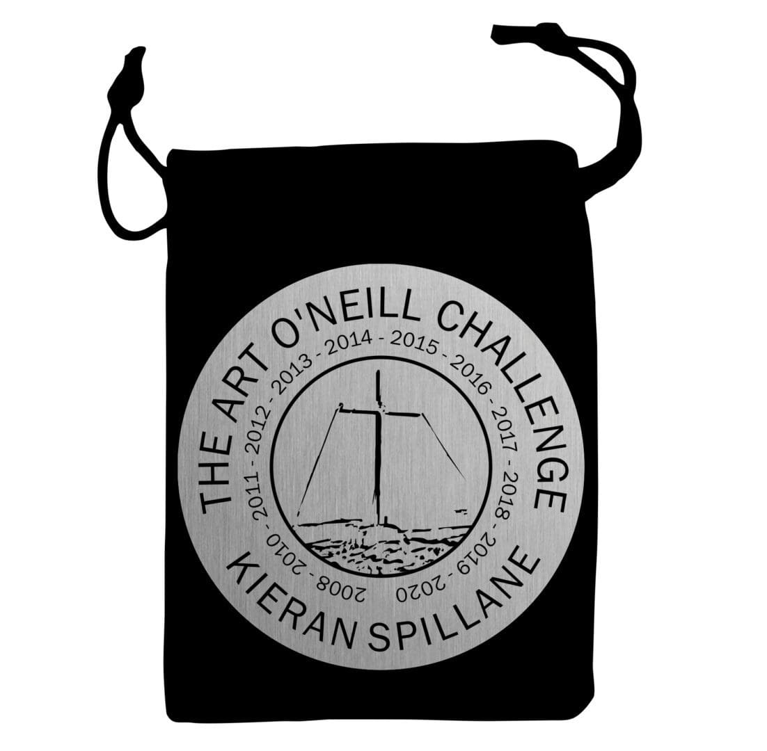 A black bag with a silver medal on it