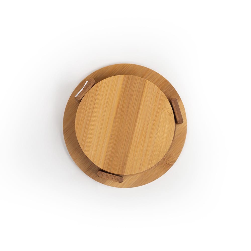 Round bamboo serving tray with handles.